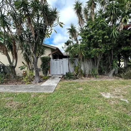 Rent this 2 bed townhouse on 8007 Ambach Way in Hypoluxo, Palm Beach County