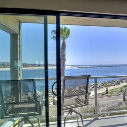 Rent this 3 bed condo on 2595 Ocean Front Walk in San Diego, CA 92109