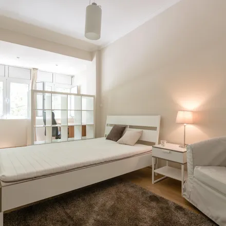 Rent this 3 bed room on Rua Professor Reinaldo dos Santos 17 in 1500-102 Lisbon, Portugal