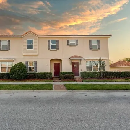 Buy this 4 bed townhouse on 3157 Camino Real Drive North in Buenaventura Lakes, FL 34744