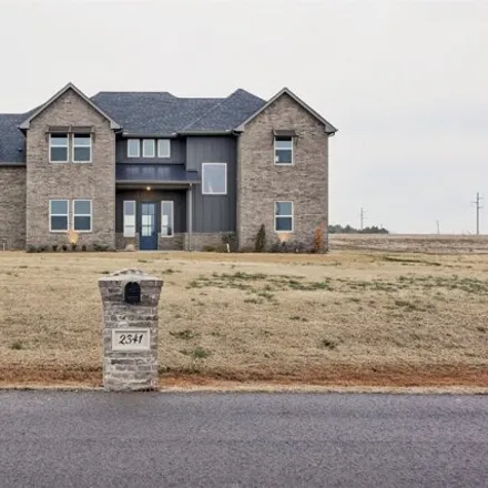 Buy this 4 bed house on 2421 South May Avenue in Cedar Valley, Logan County