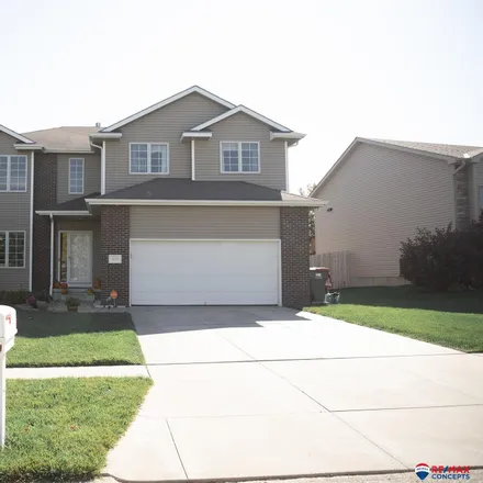 Buy this 4 bed house on 8721 Prairie Village Drive in Lincoln, NE 68507