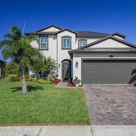 Buy this 5 bed house on 4308 Trovita Circle in West Melbourne, FL 32904