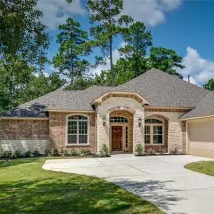 Buy this 4 bed house on 911 Weeping Willow Way in Magnolia, Texas