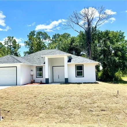 Buy this 3 bed house on 2561 33rd Street West in Lehigh Acres, FL 33971