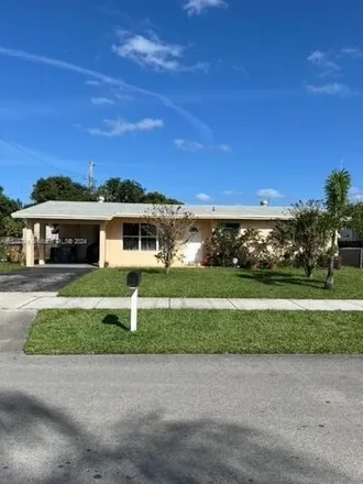 Rent this 3 bed house on 5100 Northeast 6th Avenue in Park Haven, Deerfield Beach