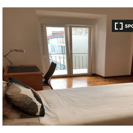 Rent this 5 bed room on Shop 1one in Rua Morais Soares, 1000-098 Lisbon