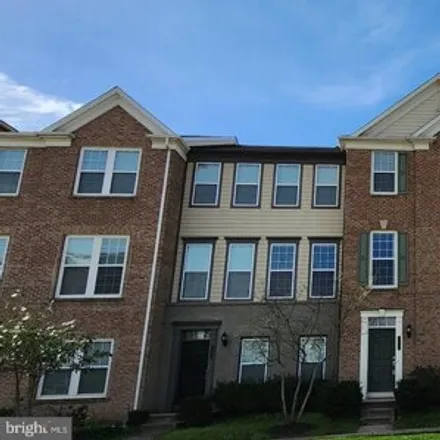 Rent this 4 bed townhouse on Heartleaf Terrace Southeast in Leesburg, VA 22075
