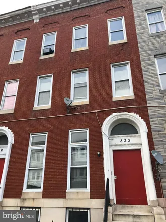 Buy this studio townhouse on 814 North Fulton Avenue in Baltimore, MD 21217