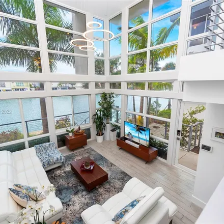 Rent this 3 bed townhouse on 41 North Shore Drive in Isle of Normandy, Miami Beach
