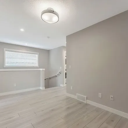 Rent this 3 bed apartment on Creekside Drive SW in Calgary, AB T2X 0G2
