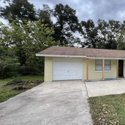 Buy this 3 bed house on 5698 Northeast 6th Street in Marion County, FL 34470