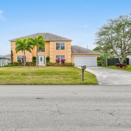 Buy this 4 bed house on 1349 Southwest del Rio Boulevard in Port Saint Lucie, FL 34953