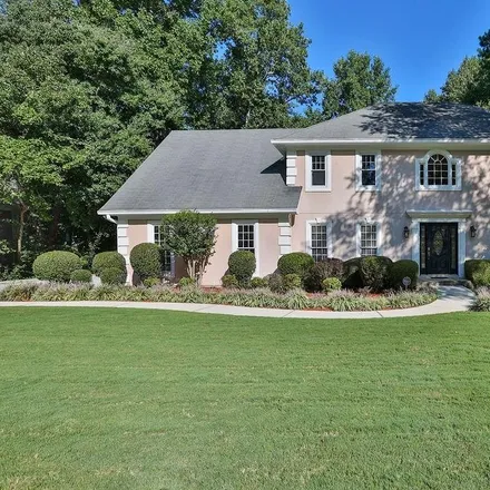 Buy this 5 bed house on 5020 Trevino Circle in Gwinnett County, GA 30096