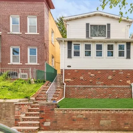 Buy this 3 bed house on 12-17 119th Street in New York, NY 11356