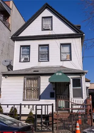 Buy this 7 bed house on 37-55 99th Street in New York, NY 11368