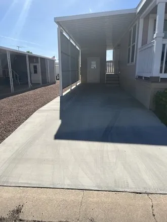 Buy this studio apartment on Blue Star Mobile Home Park in 11050 East Apache Trail, Apache Junction