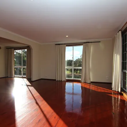Rent this 4 bed apartment on Australian Capital Territory in 7 Whittell Crescent, Florey 2615