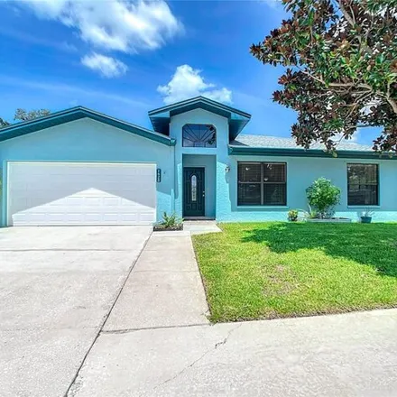 Buy this 3 bed house on 1428 Overcash Dr in Dunedin, Florida
