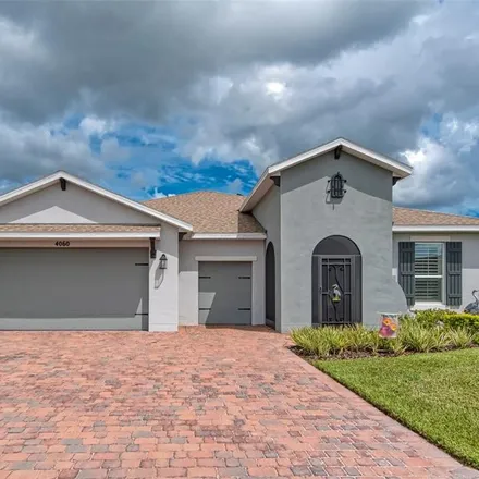 Buy this 4 bed house on 899 Toledo Court in Poinciana, FL 34758