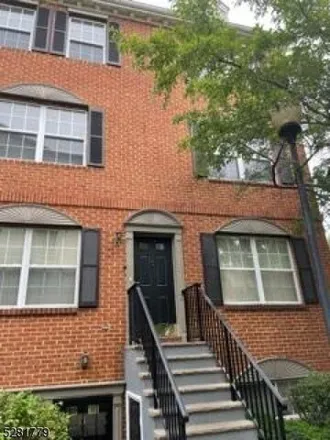 Rent this 3 bed townhouse on 72 Hampden Street in Newark, NJ 07103