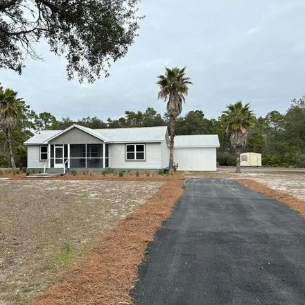 Buy this 3 bed house on 399 Carroll Street in Franklin County, FL 32328