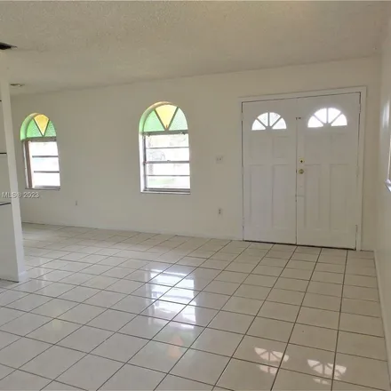 Rent this 2 bed apartment on 7436 Southwest 22nd Street in Miami-Dade County, FL 33155