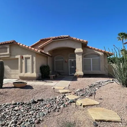 Rent this 3 bed house on 4528 East Thistle Landing Drive in Phoenix, AZ 85044