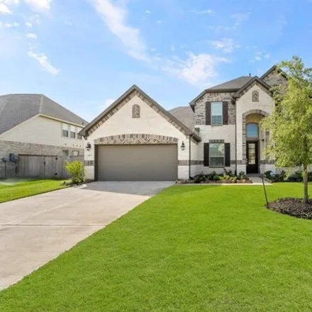 Rent this 4 bed house on 1407 Woodson Ridge Lane in Katy, TX 77494