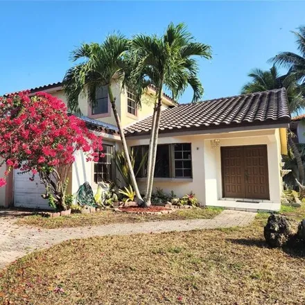 Buy this 4 bed house on 8745 Northwest 150th Terrace in Miami Lakes, FL 33018