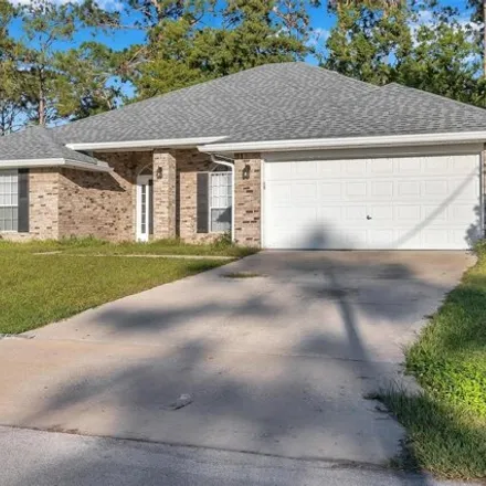 Buy this 4 bed house on 98 Roxboro Drive in Palm Coast, FL 32164