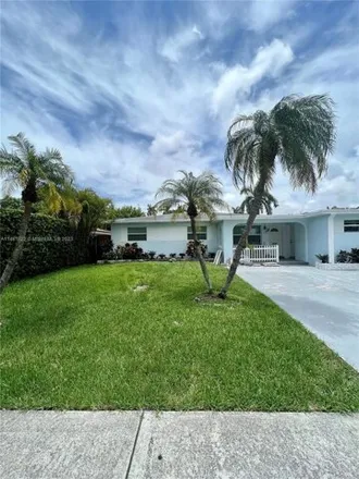 Rent this 3 bed house on 888 Northeast 4th Street in Hallandale Beach, FL 33009