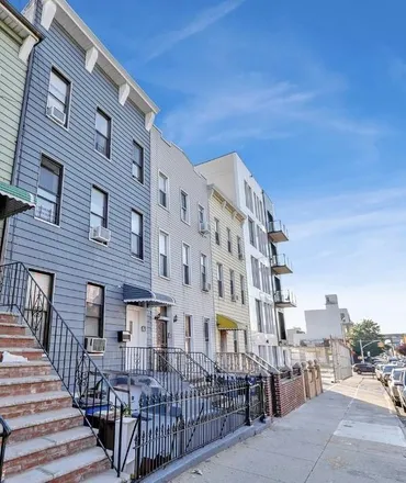 Buy this 12 bed townhouse on 144 14th Street in New York, NY 11215