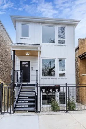 Rent this 3 bed house on 2722 West 23rd Street in Chicago, IL 60623