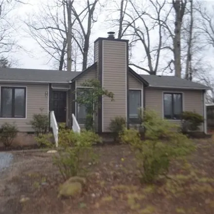 Rent this 3 bed house on 2473 Harley Drive in Pipers Glen, Greensboro