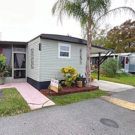 Buy this studio apartment on Chisum Trail in Curlew, Palm Harbor