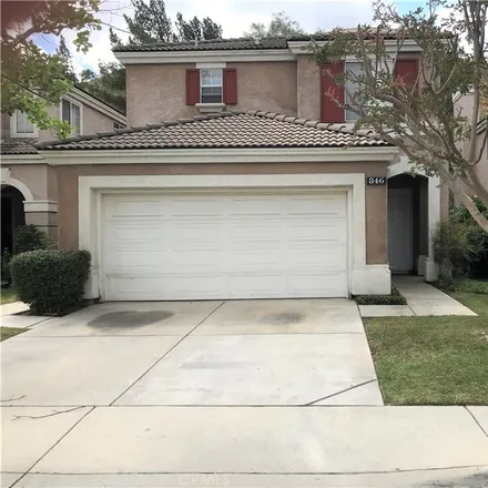 Rent this 4 bed house on 846 Cimarron Lane in Corona, CA 92879