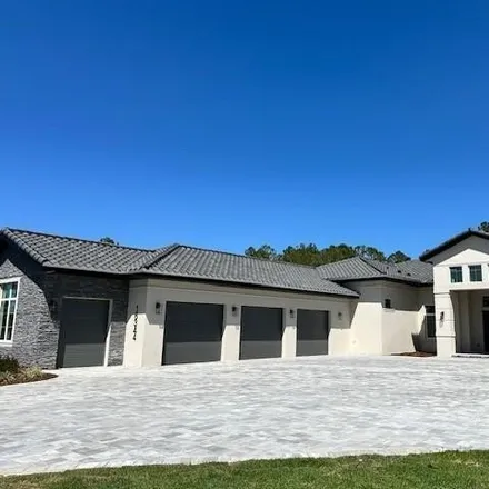 Buy this 4 bed house on 16344 Pendio Drive in Lake County, FL 34756