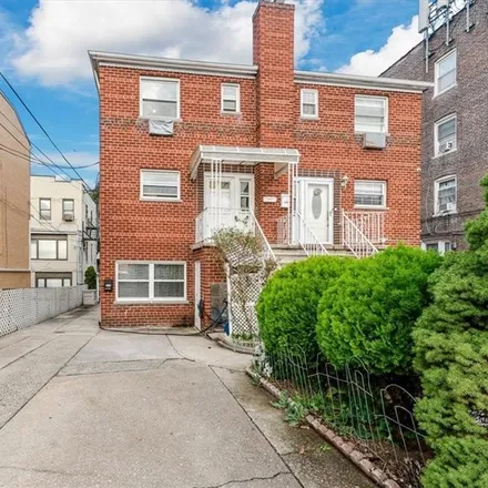 Buy this 4 bed townhouse on 3699 East Tremont Avenue in New York, NY 10465