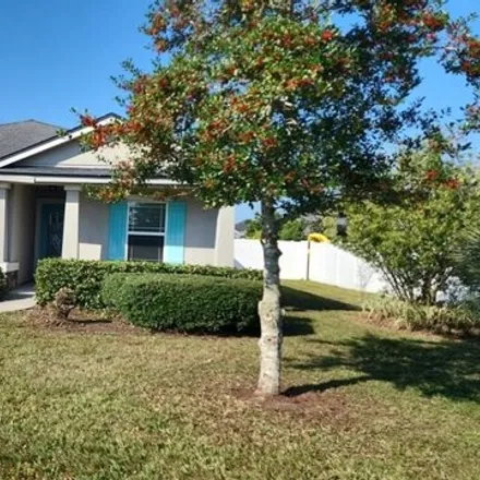 Rent this 3 bed house on 95125 Windflower Trail in Nassau County, FL 32034