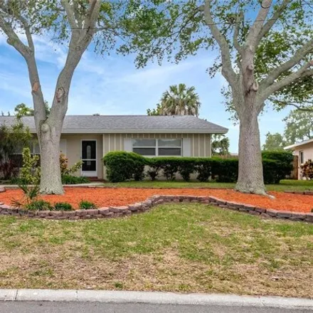 Buy this 3 bed house on 3986 Harbor Hill Drive in Harbor Bluffs, Pinellas County