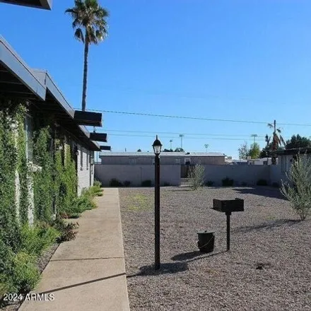 Buy this studio house on North Pastime Place in Tucson, AZ 85705