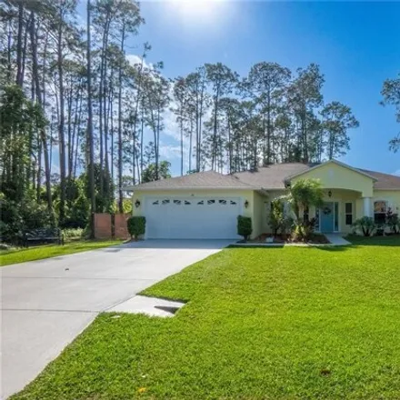 Buy this 4 bed house on 88 Eagle Crest Path in Palm Coast, FL 32164
