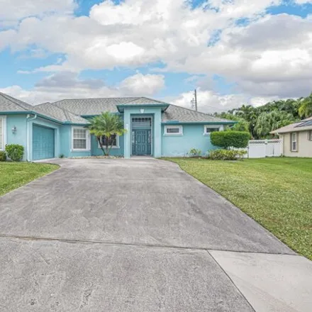 Buy this 3 bed house on 5489 Northwest Empress Circle in Port Saint Lucie, FL 34983