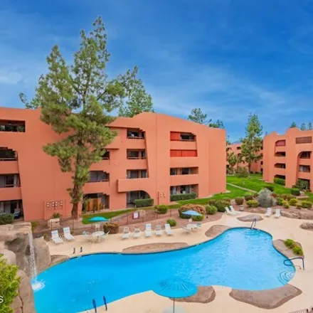 Buy this 1 bed condo on 12222 East Cactus Road in Phoenix, AZ 85032