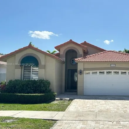 Rent this 3 bed house on 7472 Northwest 169th Lane in Palm Springs North, Hialeah