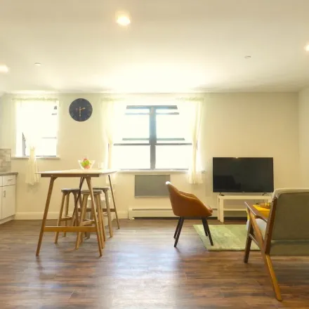 Rent this 3 bed apartment on 57-10 Woodside Avenue in New York, NY 11377