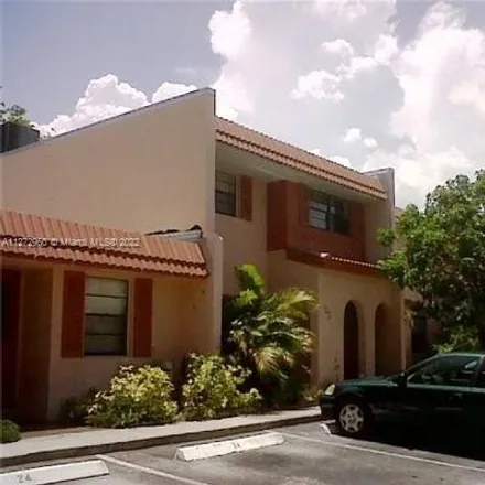 Rent this 3 bed townhouse on 23 North Valencia Drive in Davie, FL 33324