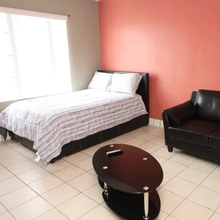 Rent this 2 bed house on 3551 S Western Ave in Los Angeles, CA