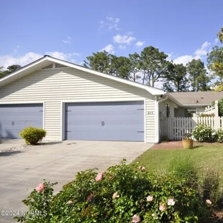 Rent this 2 bed house on 211 Inland Greens Cir in Wilmington, North Carolina